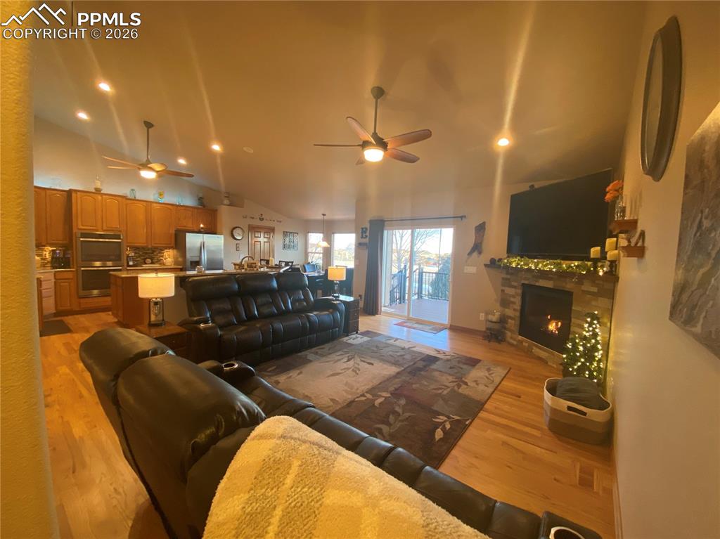 Image 5 of 47: The open concept living/kitchen/dining area has many upgrades