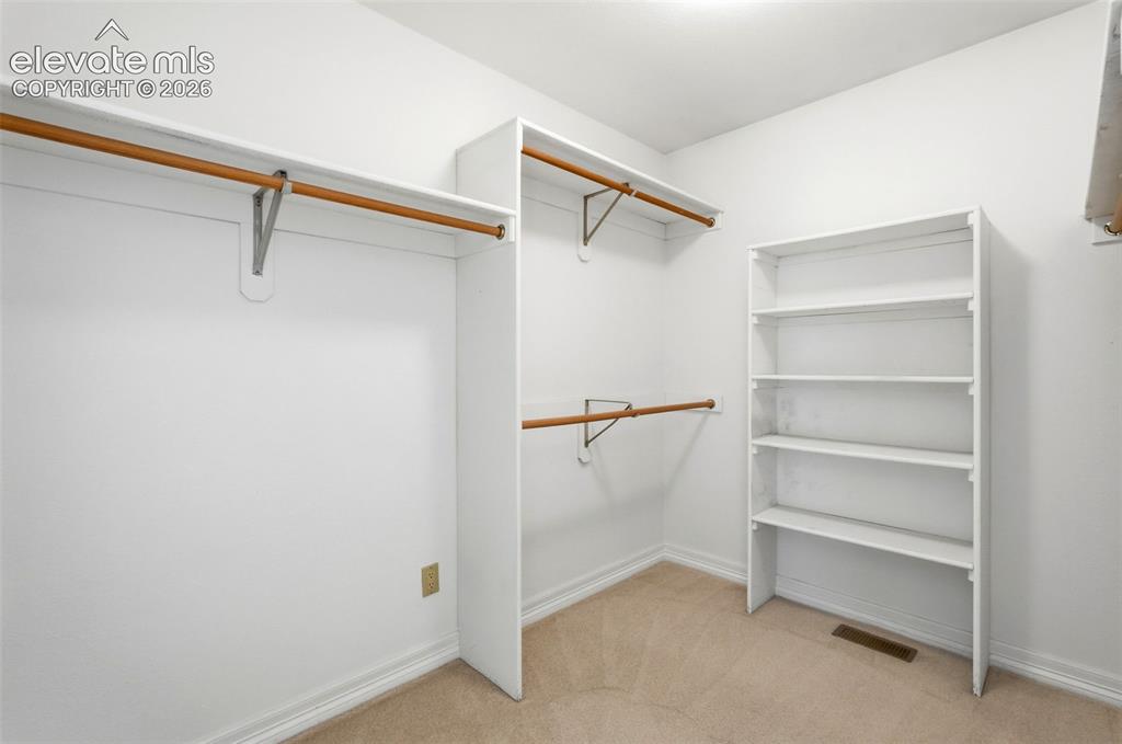 Image 22 of 49: Walk-In Closets