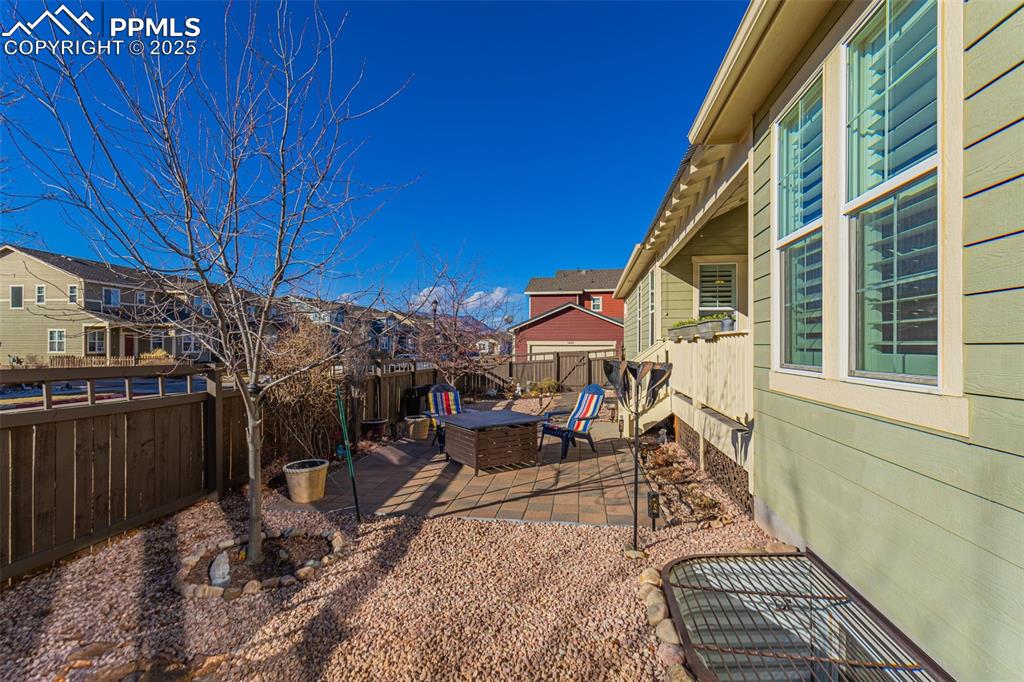 Image 24 of 42: View of yard with a patio area
