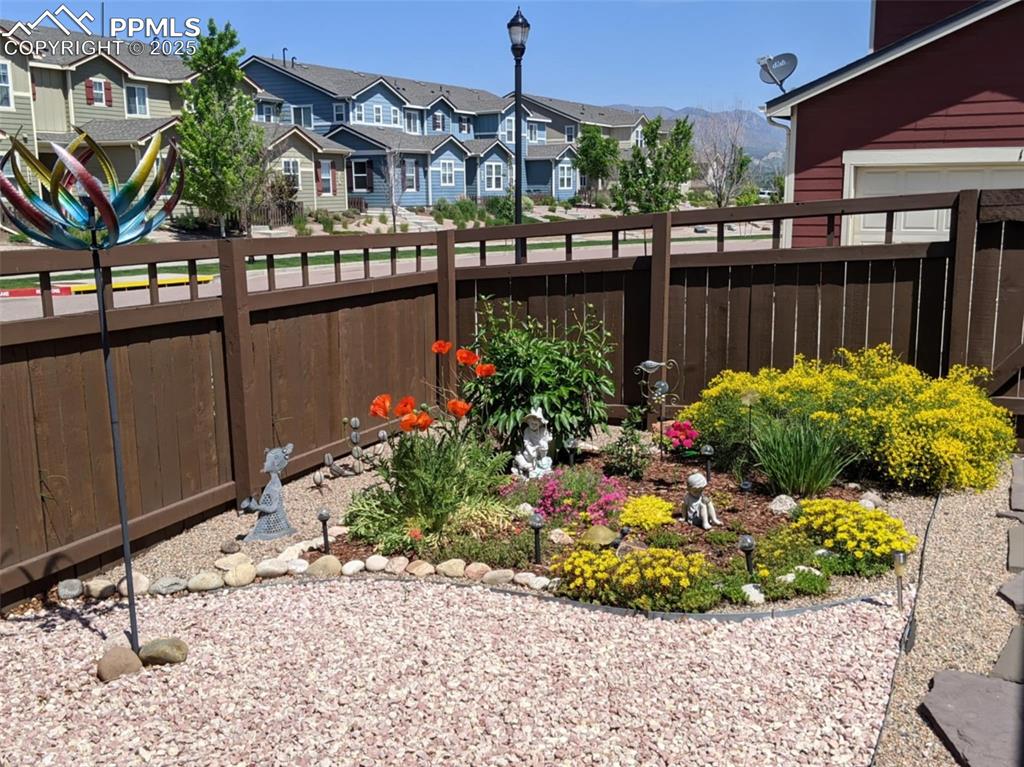 Image 33 of 42: View of yard featuring a residential view and a mountain view