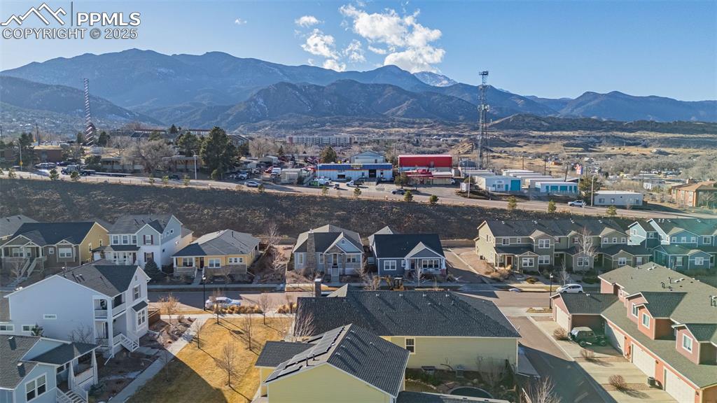 Image 44 of 49: Birds eye view of property featuring a mountain view