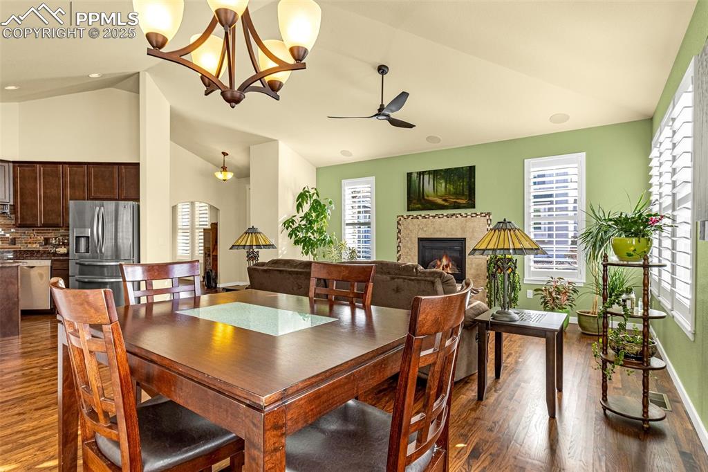 Image 8 of 42: Dining space featuring ceiling fan, dark hardwood / wood-style floors, and