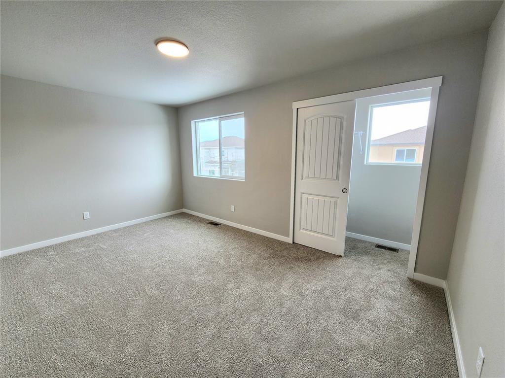 Image 12 of 18: Bedroom