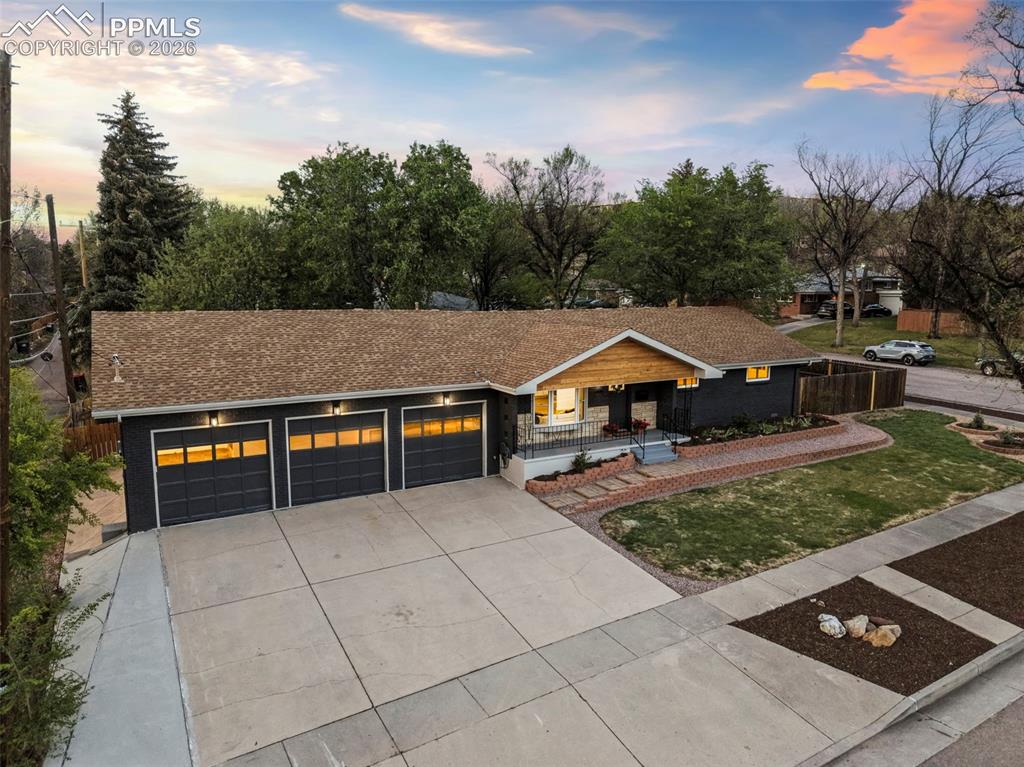 Image 3 of 46: Three car garage!
