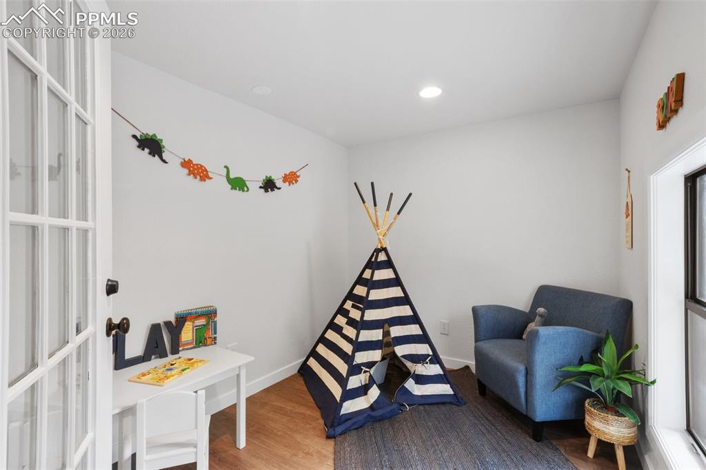 Image 37 of 46: Bonus room in garage that could be a studio, office, gym or workshop!
