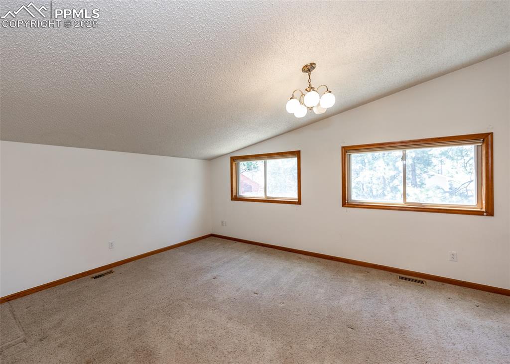 Image 16 of 50: Master Bedroom