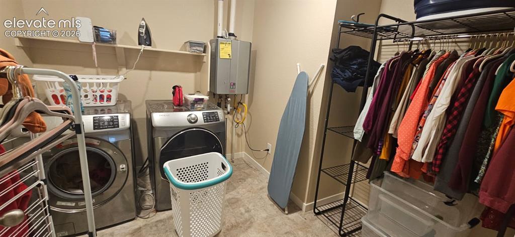 Image 15 of 35: Huge upstairs laundry roon enclsoed