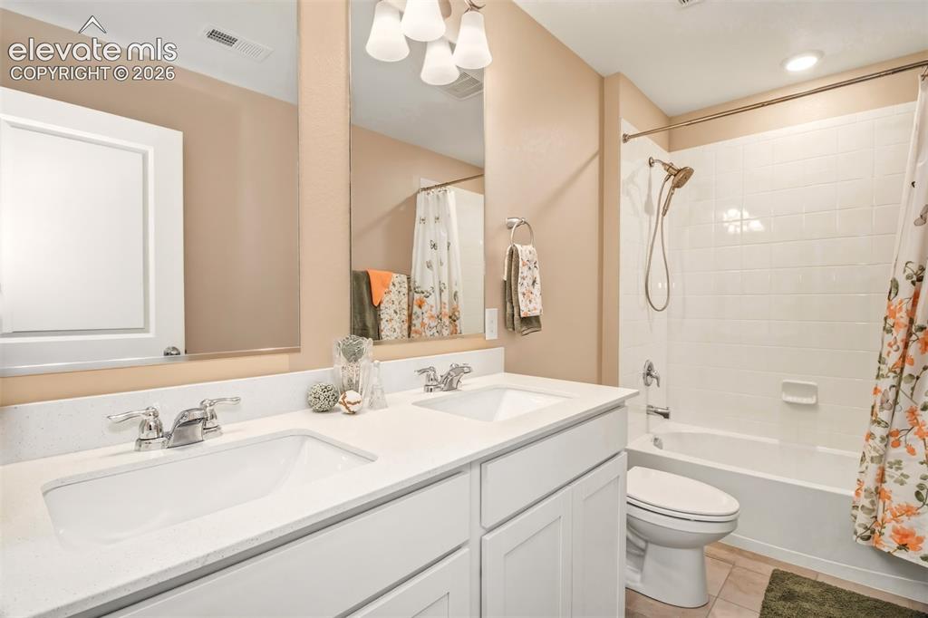 Image 24 of 35: Guest upstairs, double vanity, luxury shower head