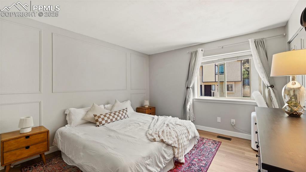 Image 15 of 38: Primary bedroom, bright and beautiful.