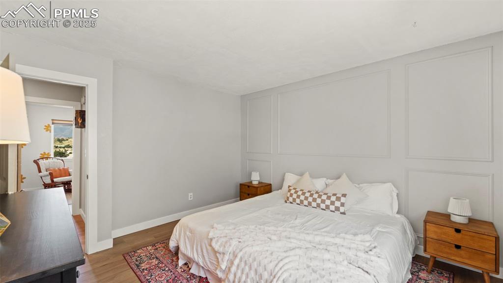 Image 16 of 38: Lovely accent wall. New LVP flooring!
