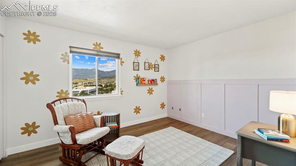 Image 18 of 38: 2nd upper level bedroom. New LVP flooring!