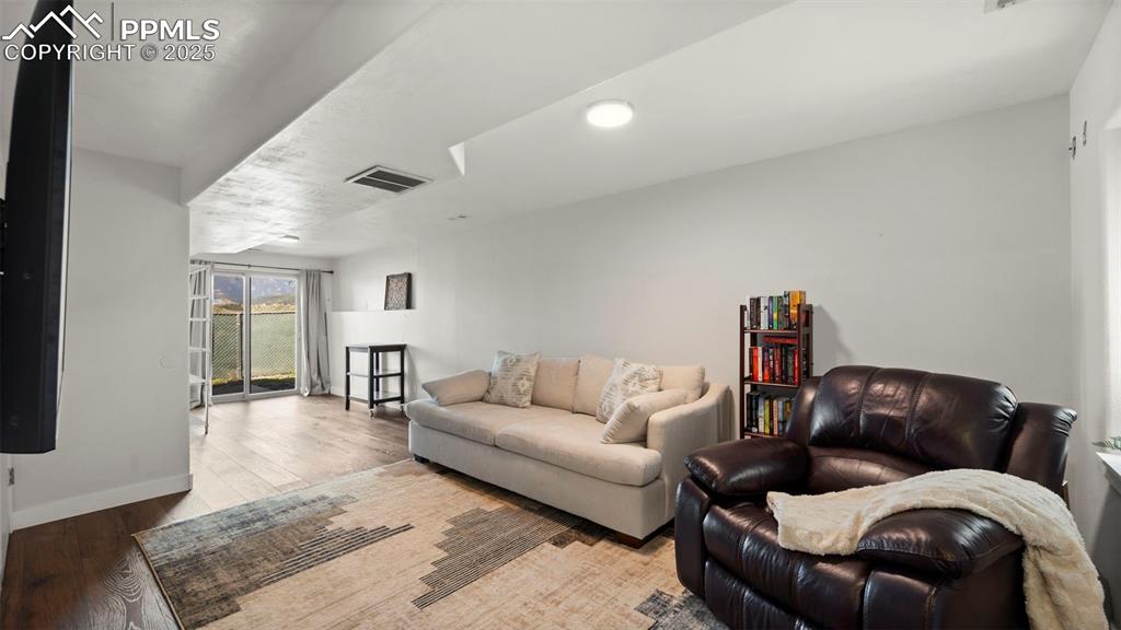 Image 20 of 38: New LVP flooring! Bright basement with a walkout!