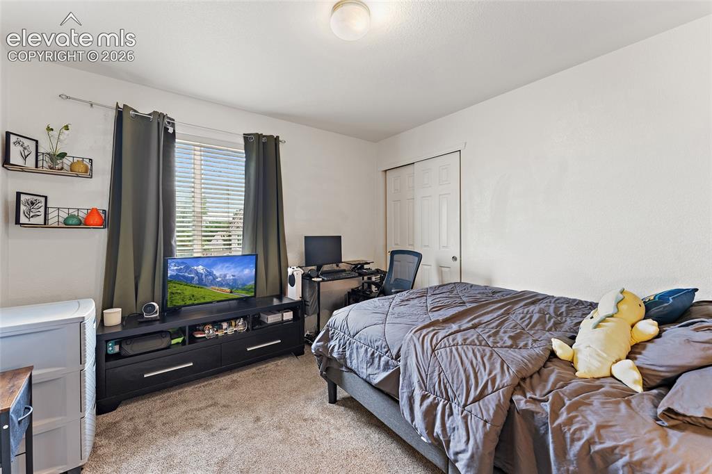 Image 19 of 37: Bedroom