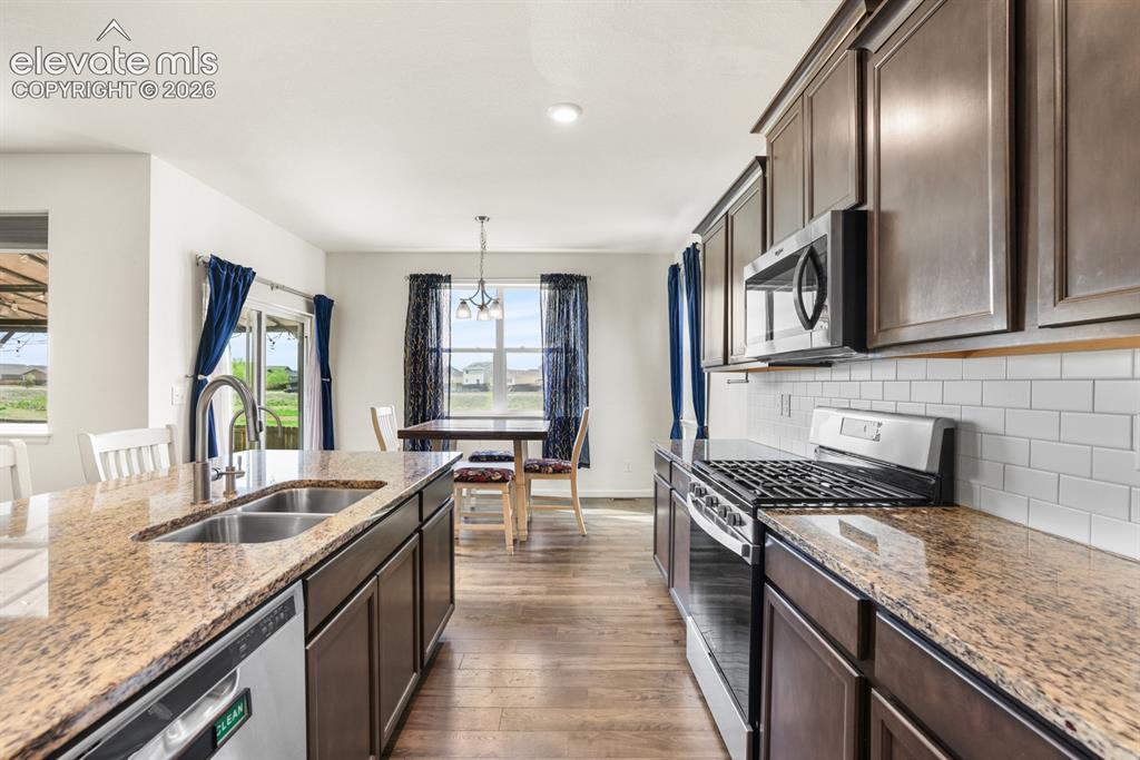 Image 18 of 42: Kitchen/Dining Area combo.