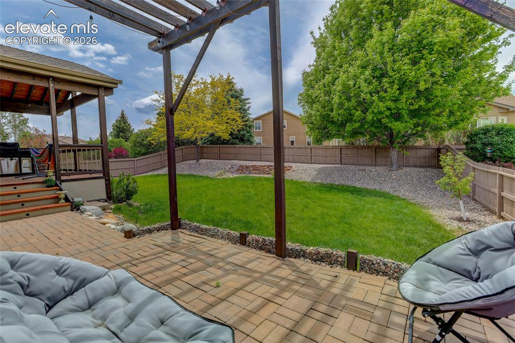 Image 26 of 27: Terrace with pergola