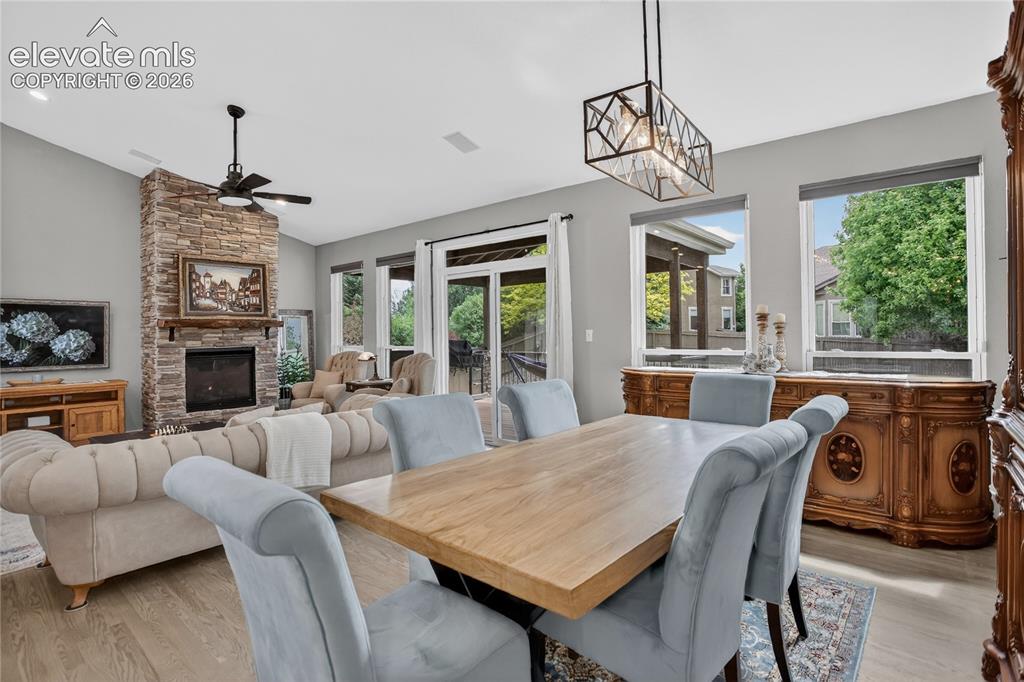 Image 5 of 27: Dining area & walk-out to deck