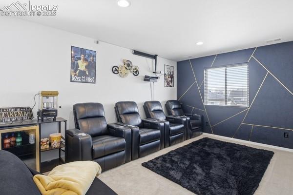 Image 13 of 36: Carpeted cinema with recessed lighting