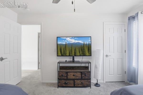 Image 25 of 36: Bedroom featuring carpet and ceiling fan