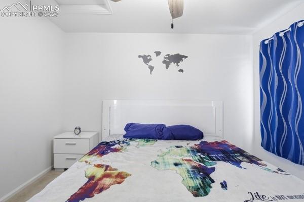 Image 31 of 36: Bedroom featuring a ceiling fan and carpet flooring