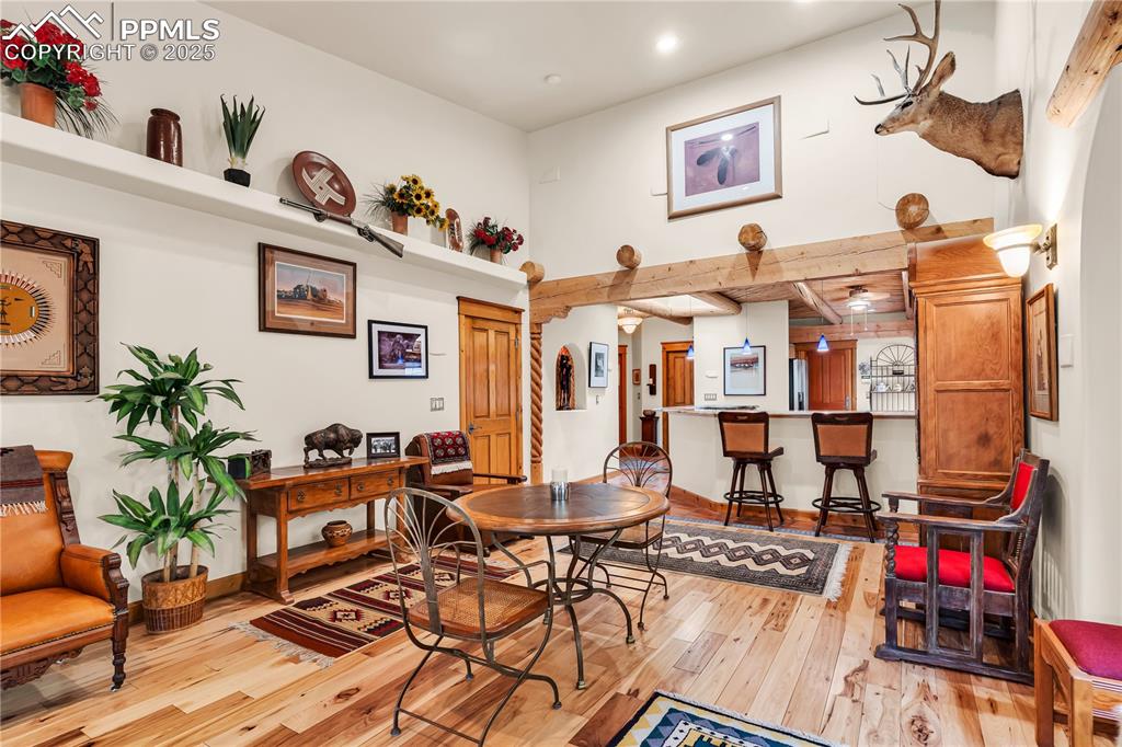 Image 16 of 43: Living room area is large enough to section in a dining area as well