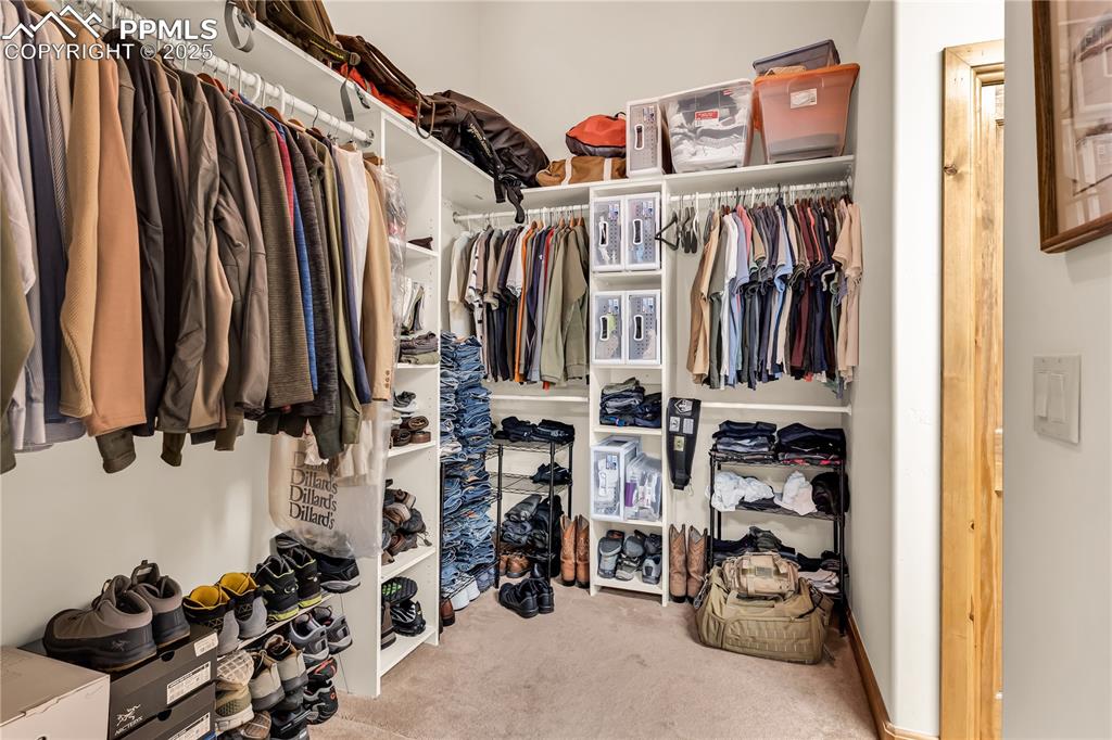 Image 30 of 43: Large walk in closet