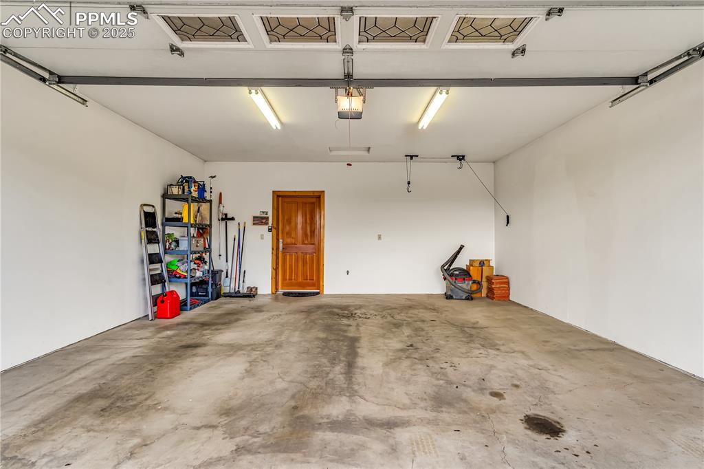 Image 37 of 43: Garage level with main floor