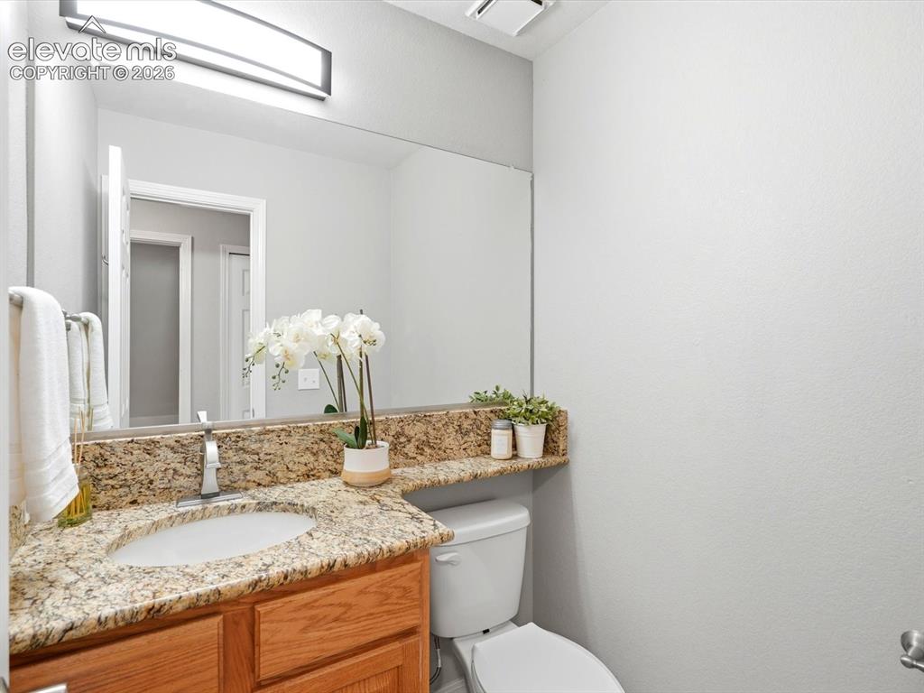 Image 14 of 39: Main floor powder room