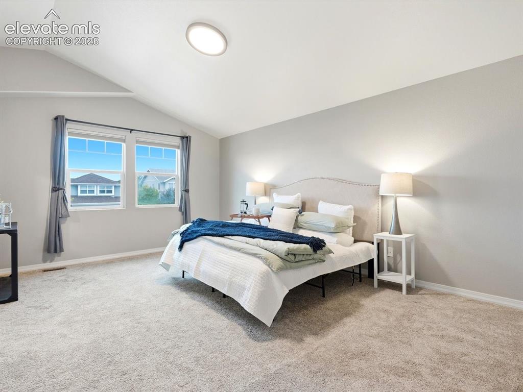 Image 20 of 39: Primary suite with mountain views