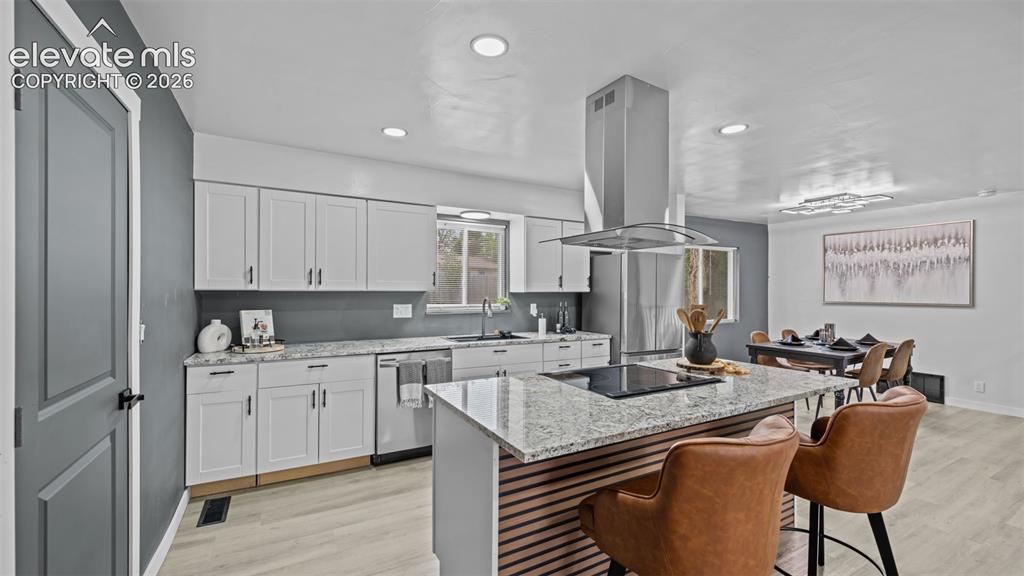 Image 8 of 21: new kitchen cabinets and new granite countertops