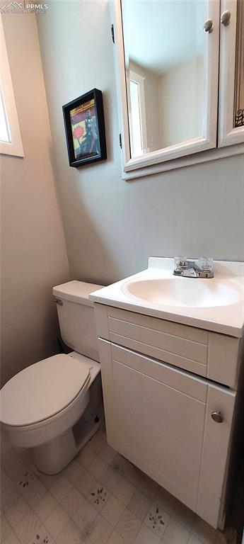 Image 35 of 46: Bathroom with vanity and toilet