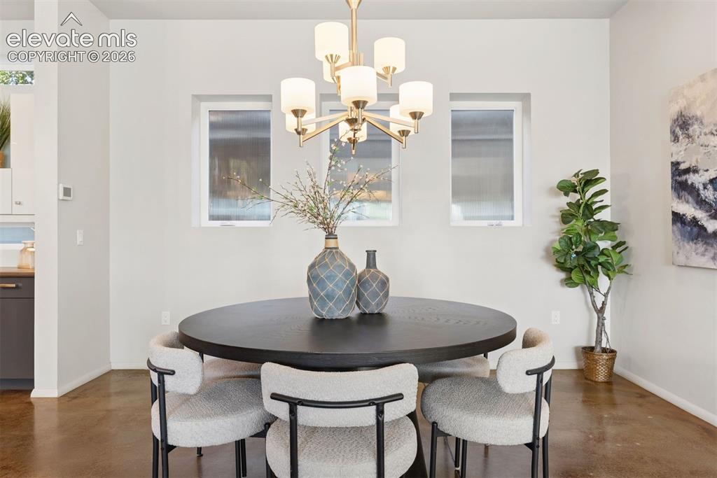 Image 14 of 45: Dining room is casual and sizable.