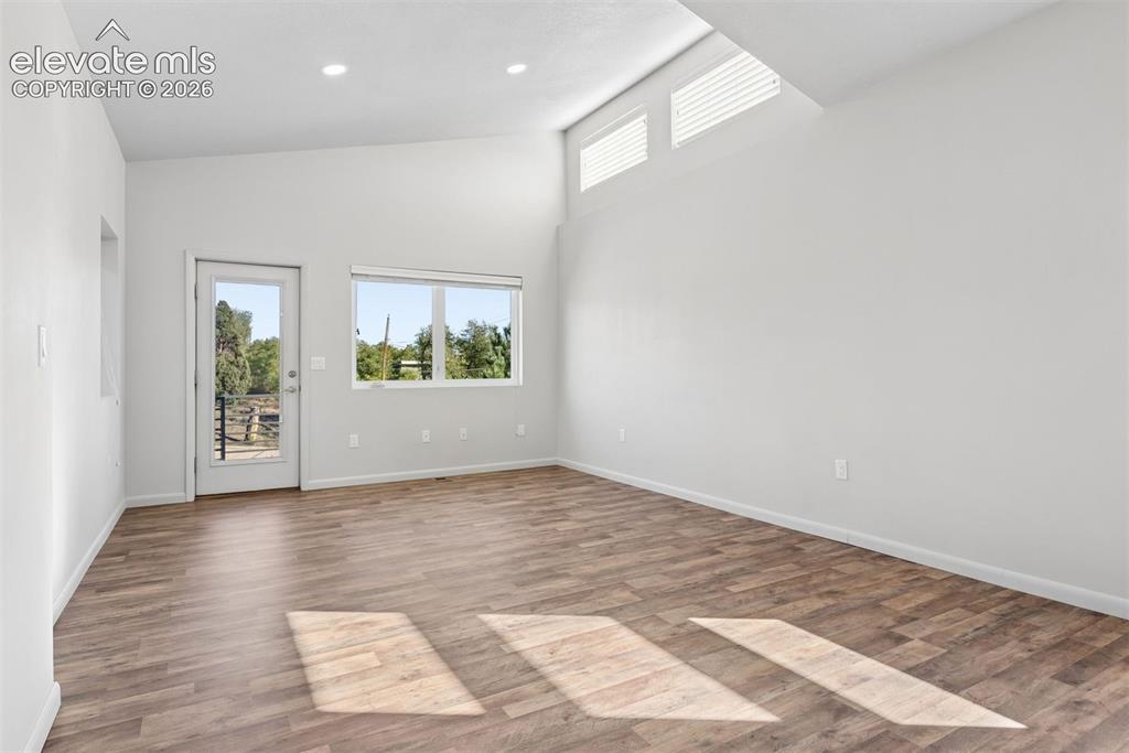 Image 29 of 45: Dormers flood the room with natural light. 