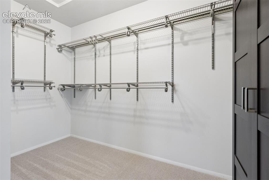 Image 33 of 45: Custom Closet organization with an aromoir