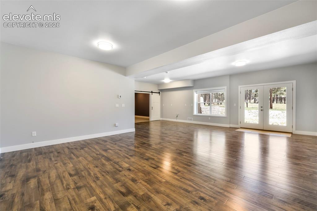 Image 32 of 50: Huge family room for entertaining in basement 