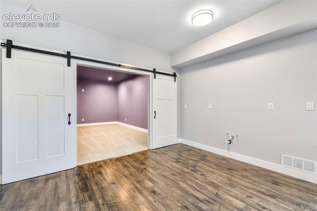Image 34 of 50: Huge family room for entertaining in basement 