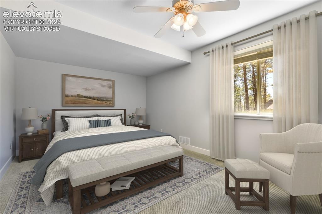 Image 38 of 50: Basement bedroom virtually staged