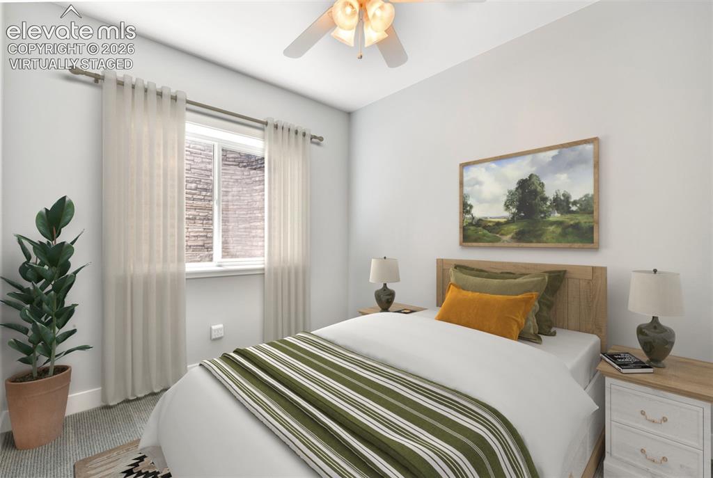 Image 40 of 50: Basement bedroom virtually staged 