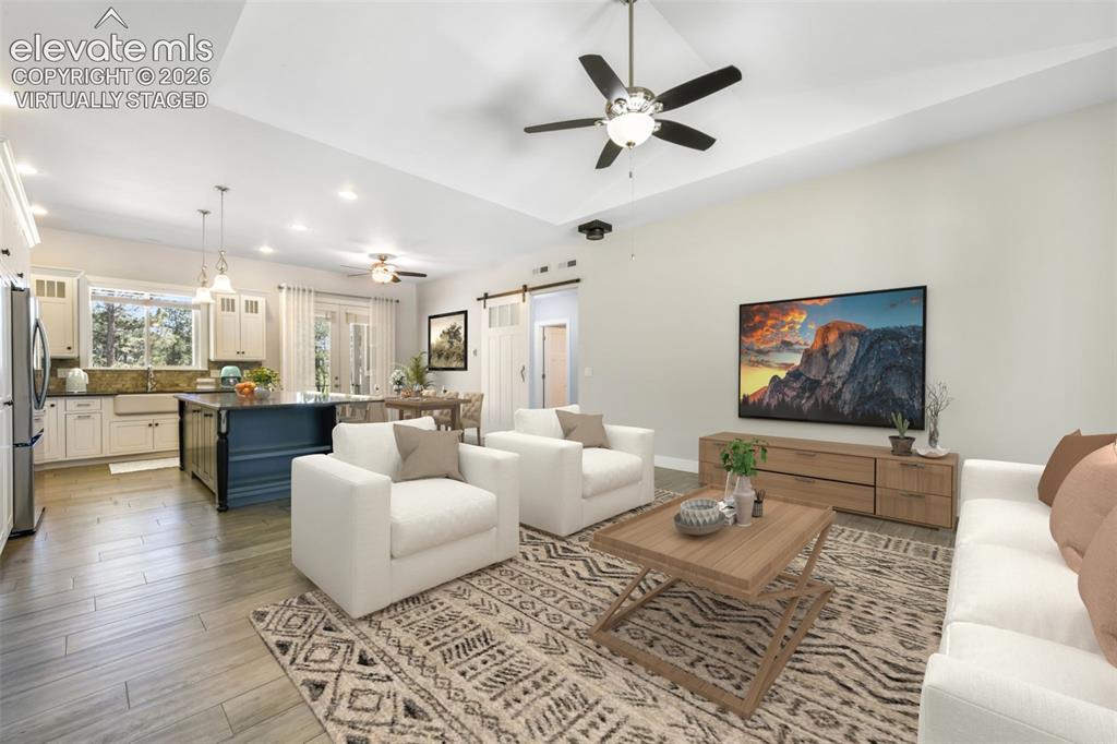Image 5 of 50: Main living room virtually staged