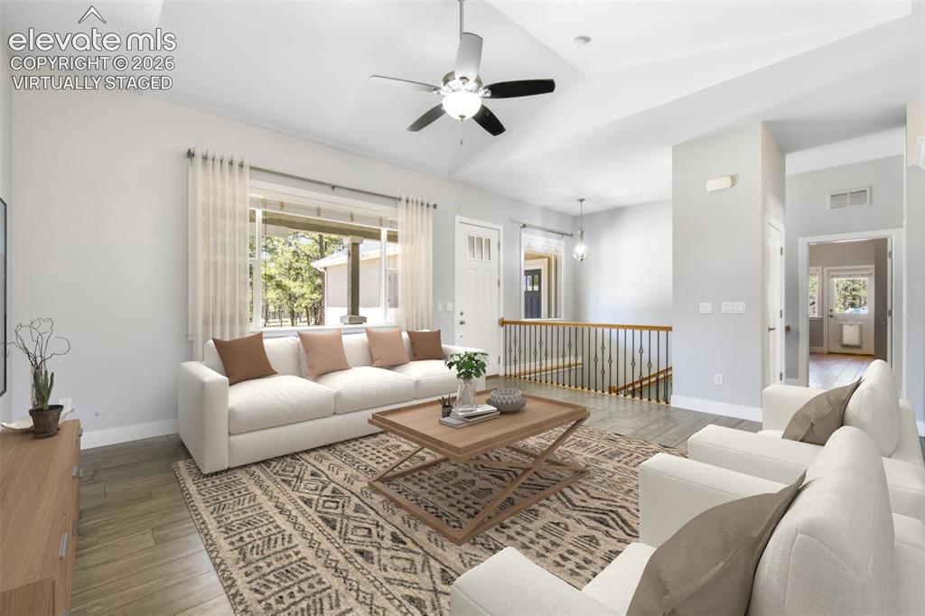 Image 9 of 50: Main living room virtually staged