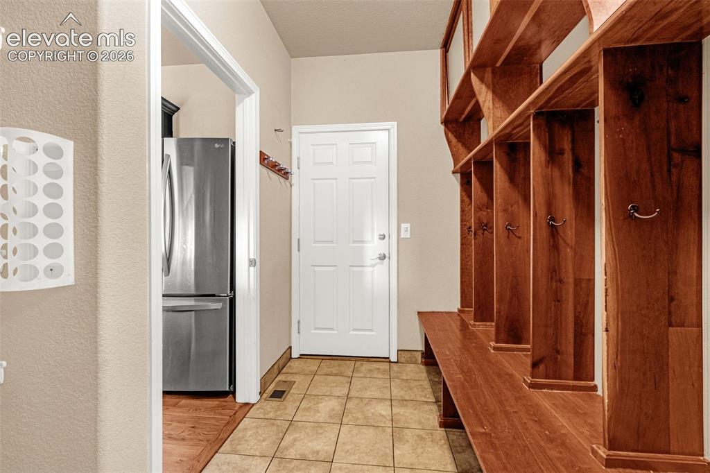 Image 13 of 48: Mud Room/Pantry - shelving not shown