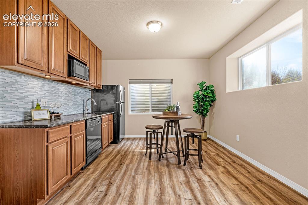 Image 35 of 48: Second kitchen with full sized appliances