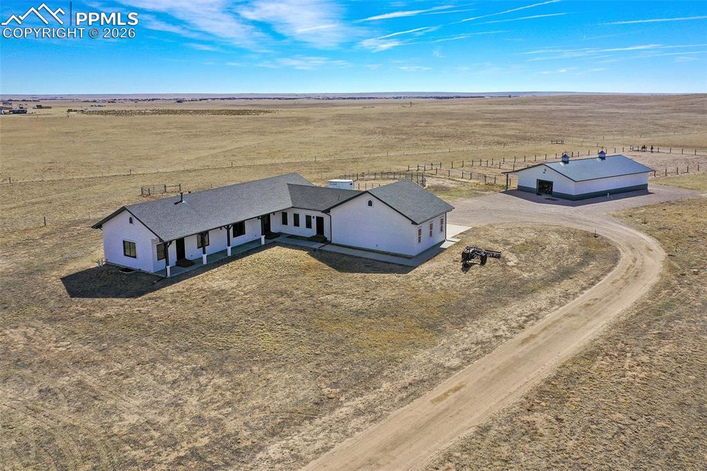 Image 1 of 49: Aerial View of the House, Barn and Entrance
