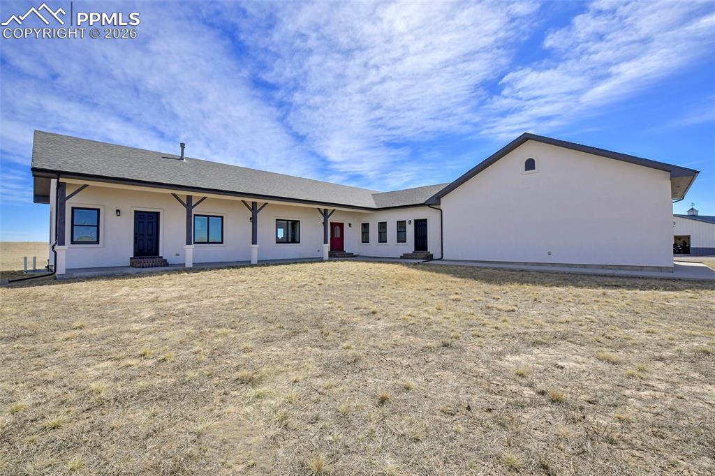 Image 2 of 49: Aerial View of the House, Barn and Entrance