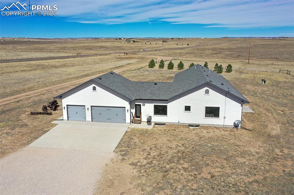 Image 3 of 49: Three Car Oversized Garage, Laundry/Mud Room with Exterior Access
