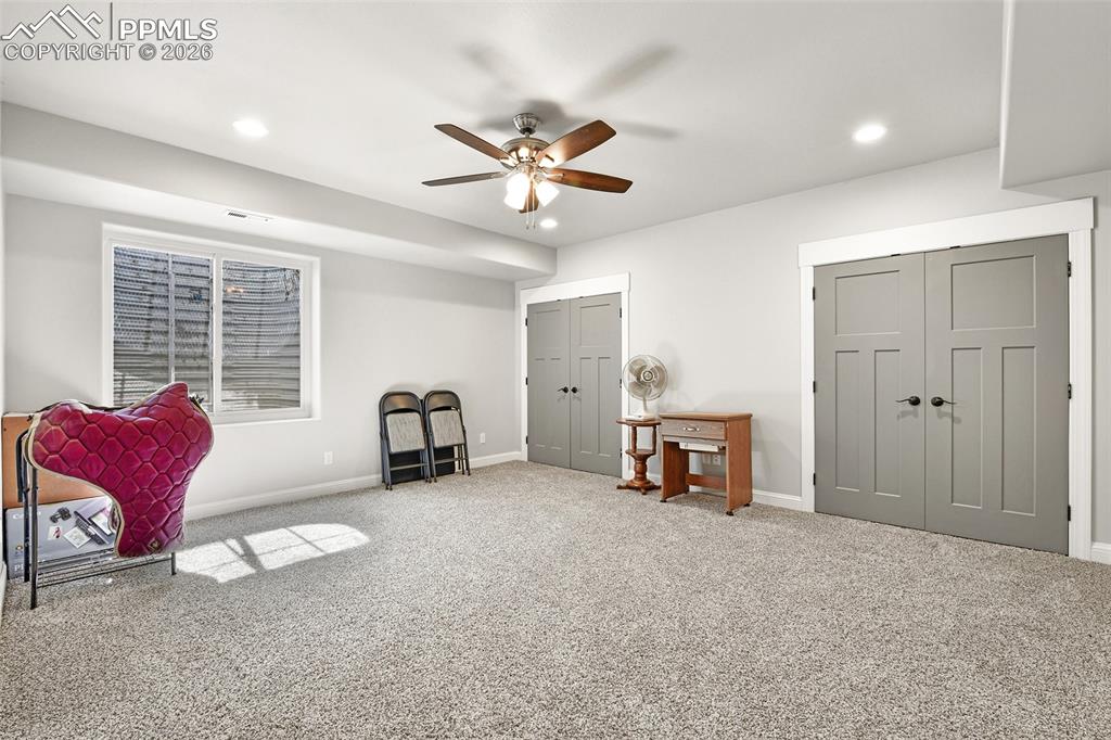 Image 32 of 49: Lower-Level Bedroom