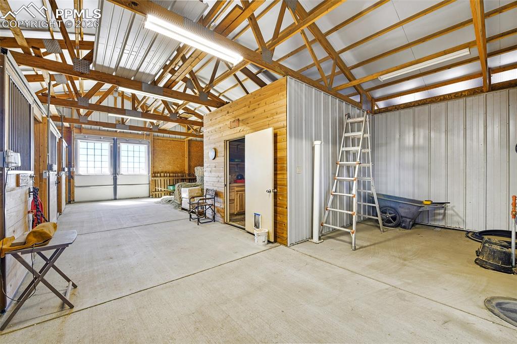 Image 43 of 49: Insulated/Condensation Proof Barn with Wash Bay and Hay Storage Area