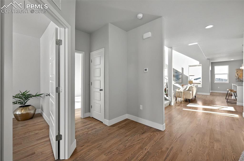Image 19 of 49: Entry area with office on the left, hall bath, entry closet and gorgeous re