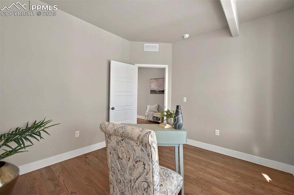 Image 21 of 49: View from office to entry!