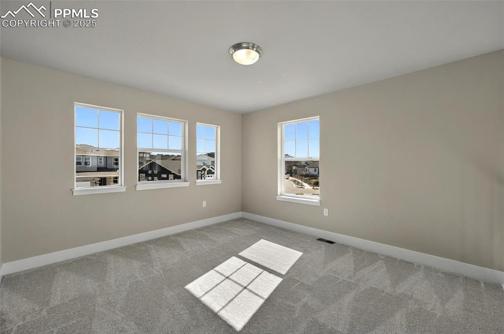Image 32 of 49: SEcond bedroom upstairs with more views!