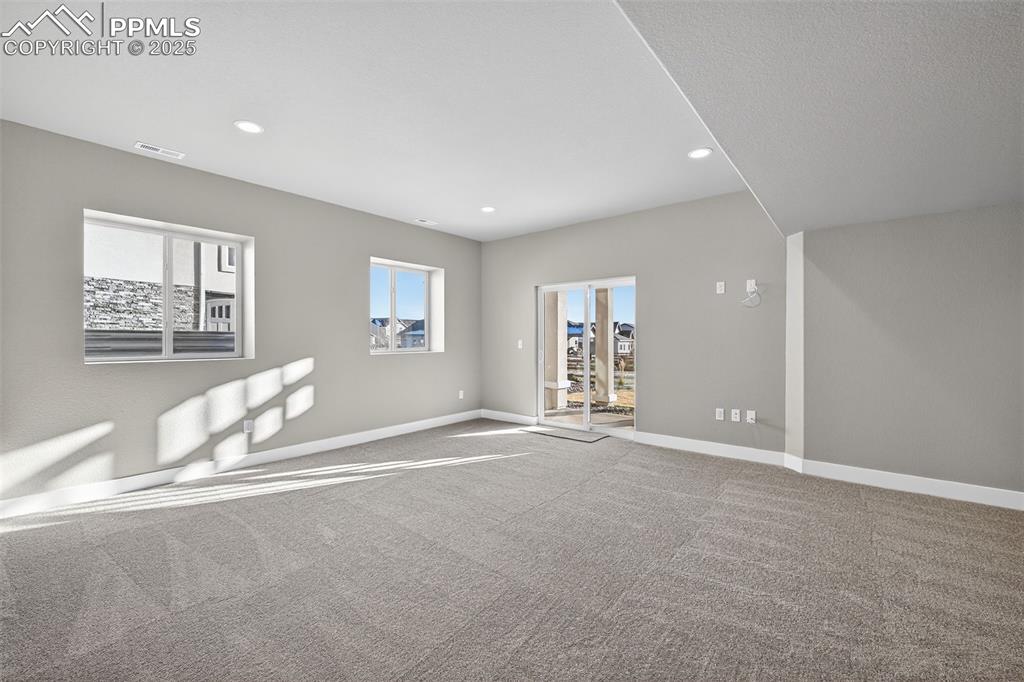 Image 36 of 49: Finished basement with views!